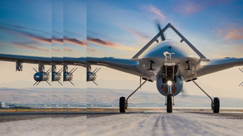 Armed unmanned aerial vehicle on runway pulsed