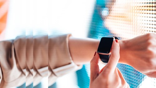 Smart watch against display with pulse