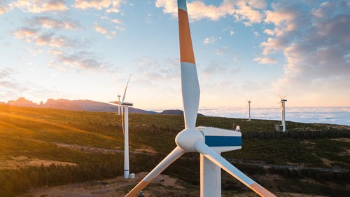 wind turbines in sunset