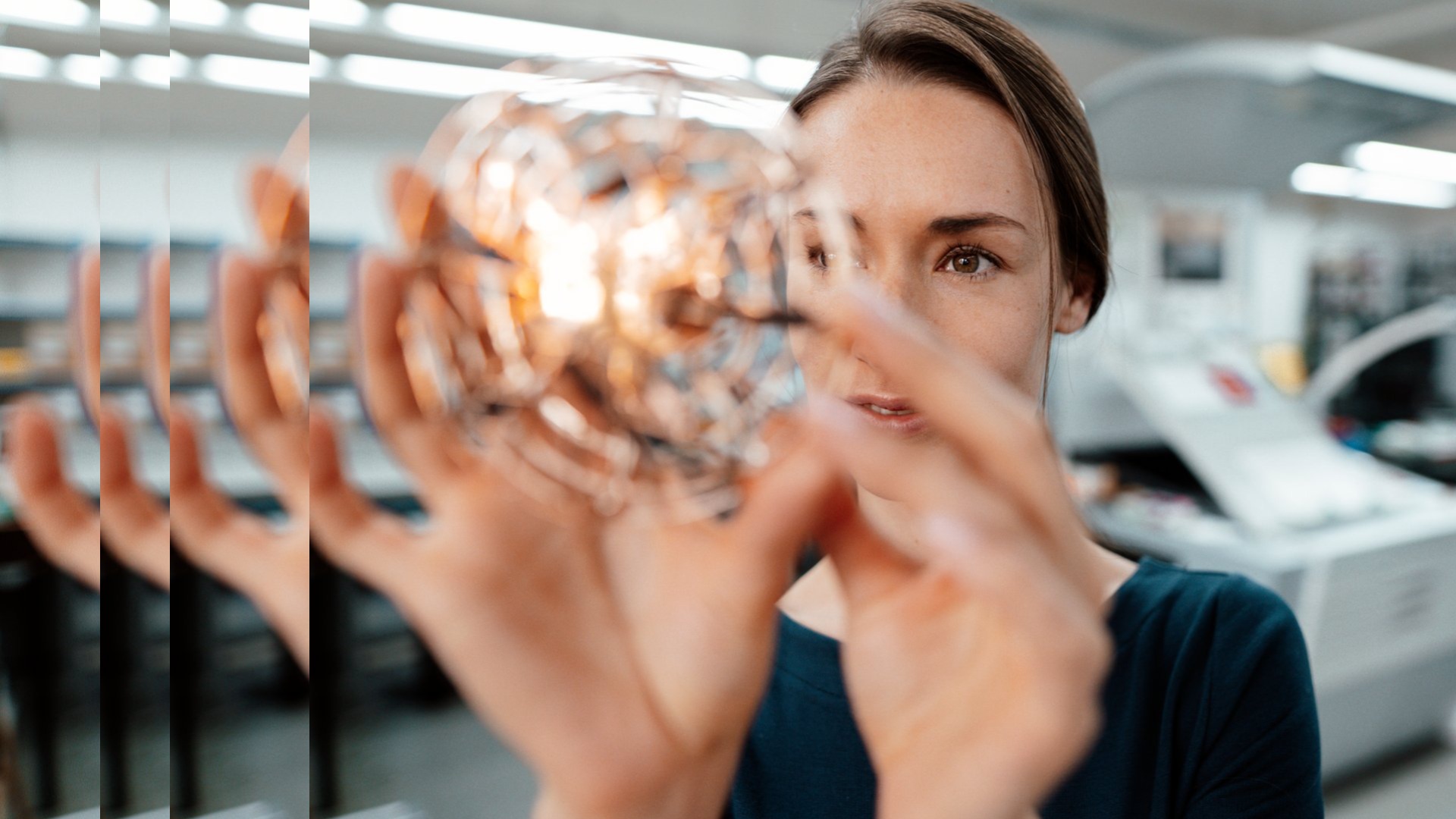 female holding a 3d drone pulsed
