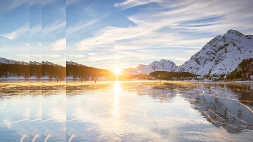 Frozen surface of the alpine lake pulsed