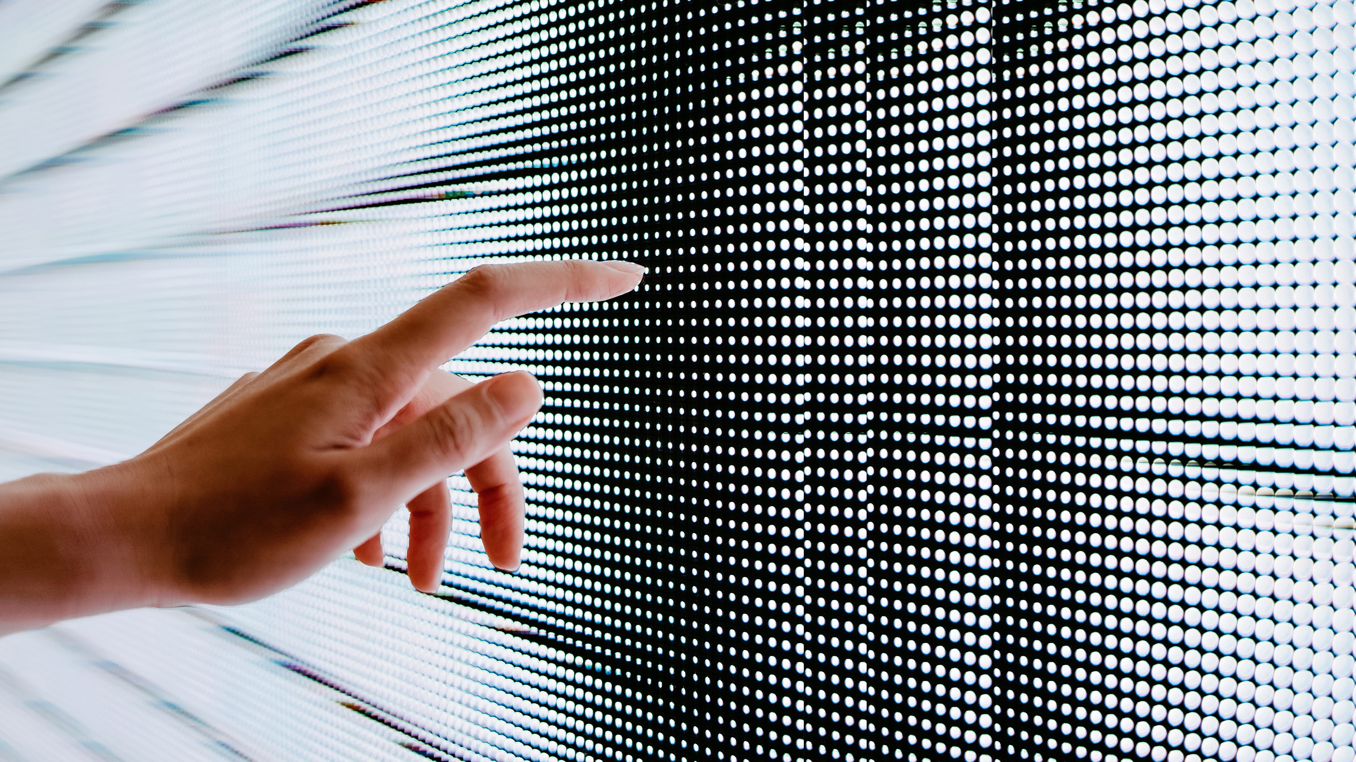 hand touching led wall screen