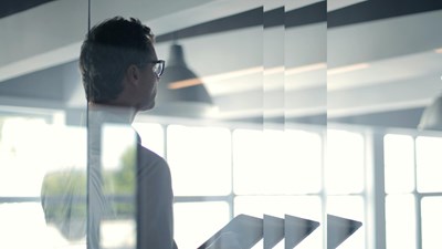 man with tablet in office