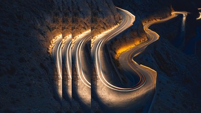 Mountain road at night pulsed