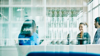 Team meeting in conference room with pulse