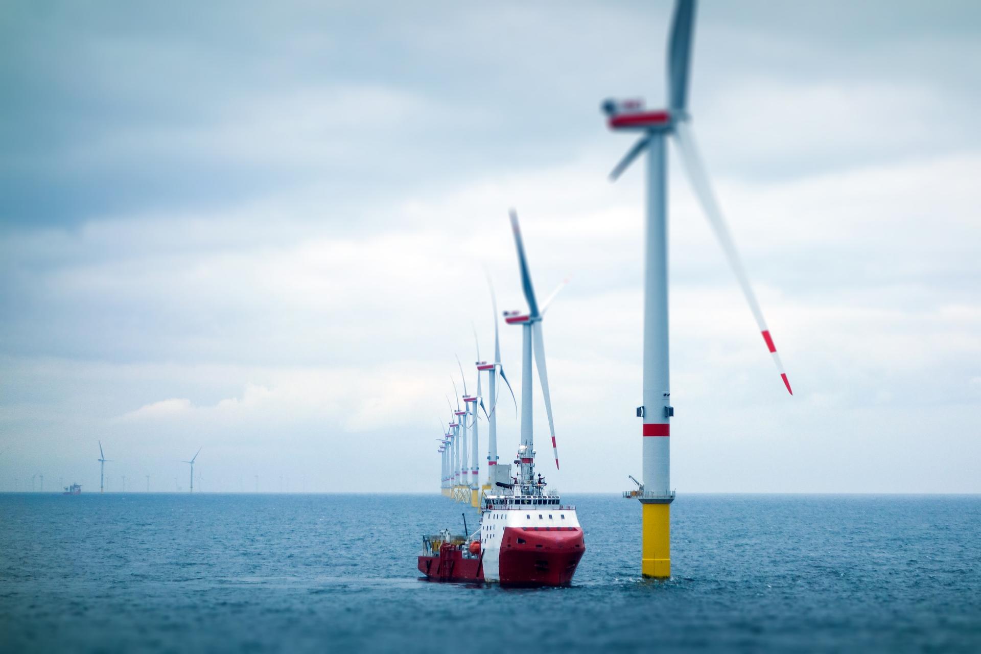 wind turbine offshore worker boat sea