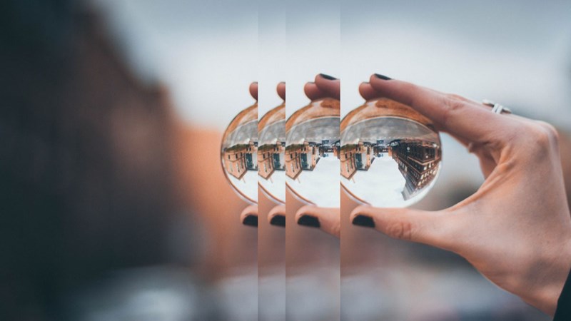 Hand with glass ball
