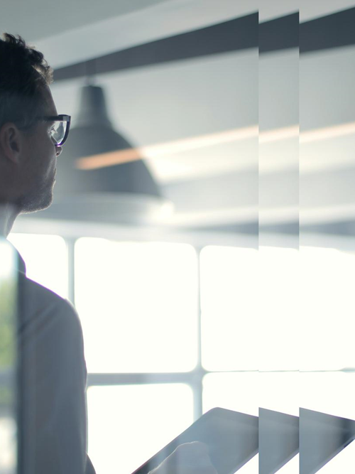 man with tablet in office