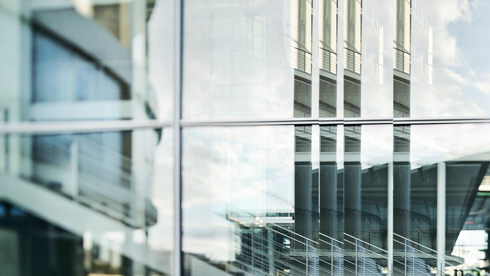 modern glass building with pulse