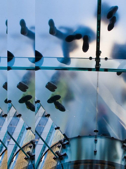 People view from below on glass stairs restructuring & insolvency