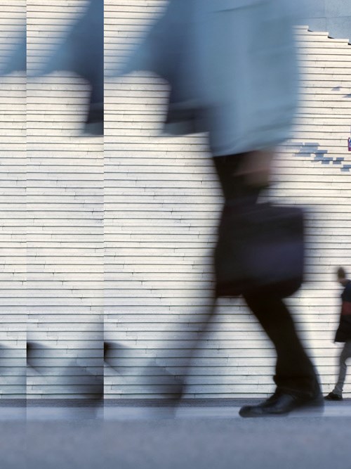 People on their way to work blurred employment and pensions