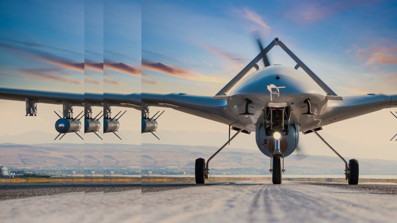 Armed unmanned aerial vehicle on runway pulsed