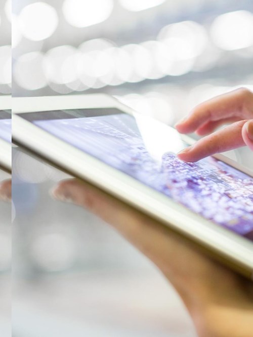 businesswoman using digital tablet with pulse